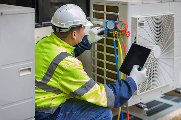 Professional Heat Pump Repair technician working in Bristol, RI